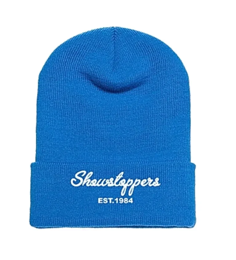 A bright blue beanie with Showstoppers and EST. 1984 printed in white text on the folded brim. -Showstoppers Dance Studio